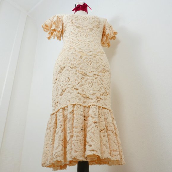 Dolce & Gabbana Dresses & Skirts - Dolce & Gabbana Ivory Lace Ruffle Sleeve Ruffle Hem Form Fitting Size 38…